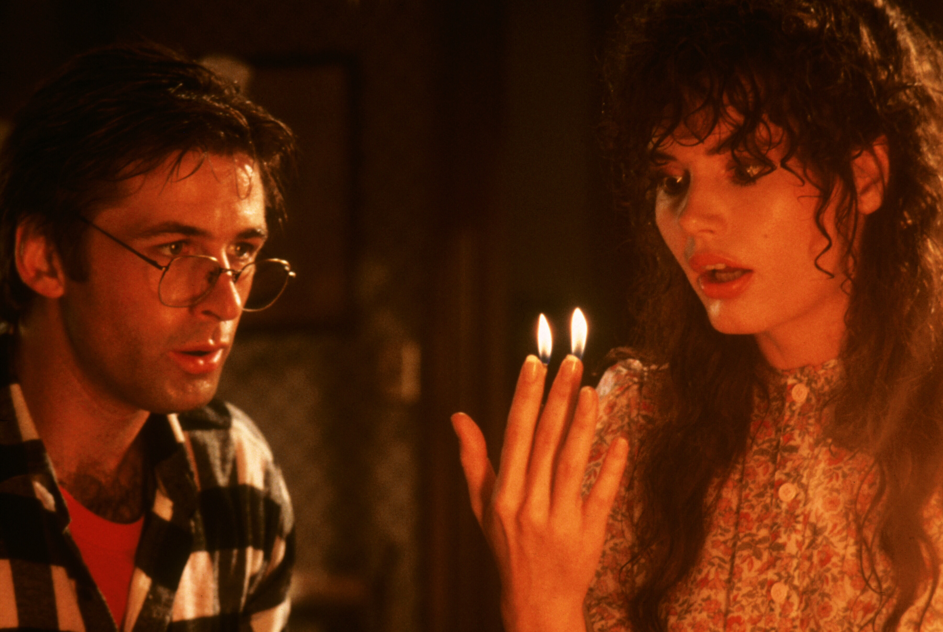 ALEC BALDWIN, GEENA DAVIS in BEETLEJUICE