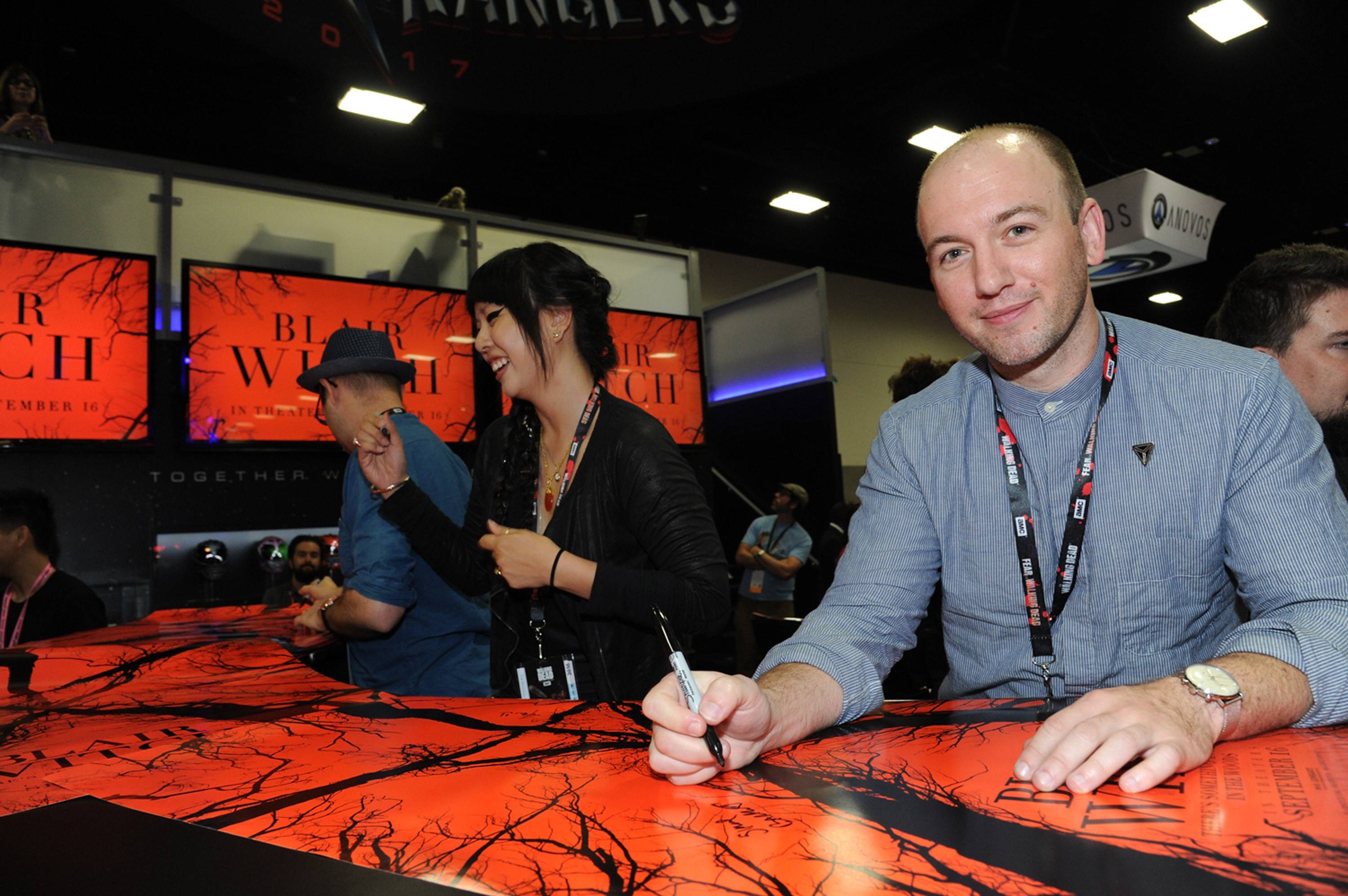 Screenwriter Simon Barrett seen at the Lionsgate Booth to sign autographs for 'Blair Witch' and meet fans at San Diego Comic-Con at 2016 Comic-Con on Saturday, July 23, 2016, in San Diego, CA. (Photo by Richard Shotwell/Invision for Lionsgate/AP Images)