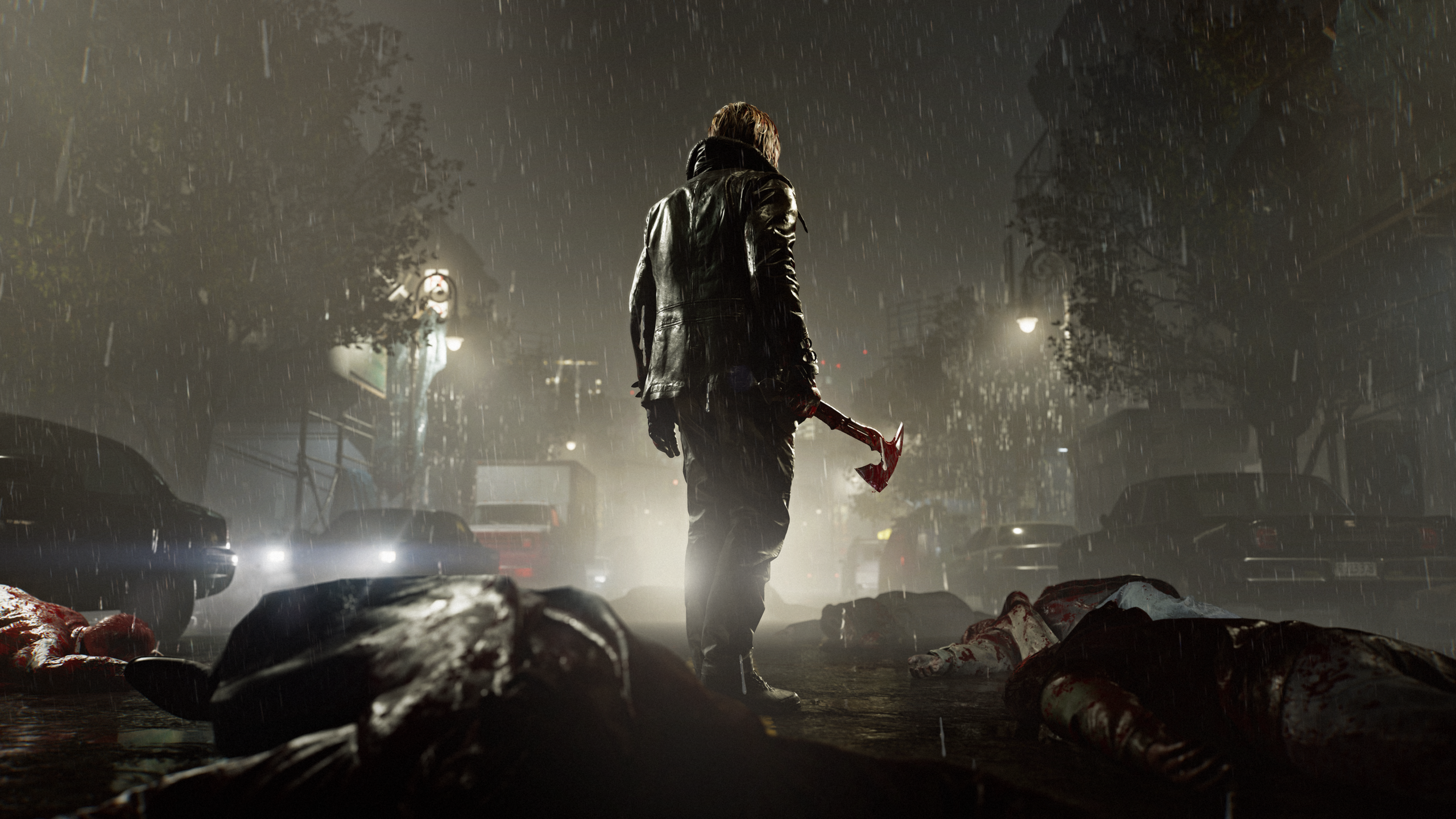 Resident Evil Requiem Review - Leon Kennedy stands in rainy Raccoon City street at night, wielding ax among pile of zombies