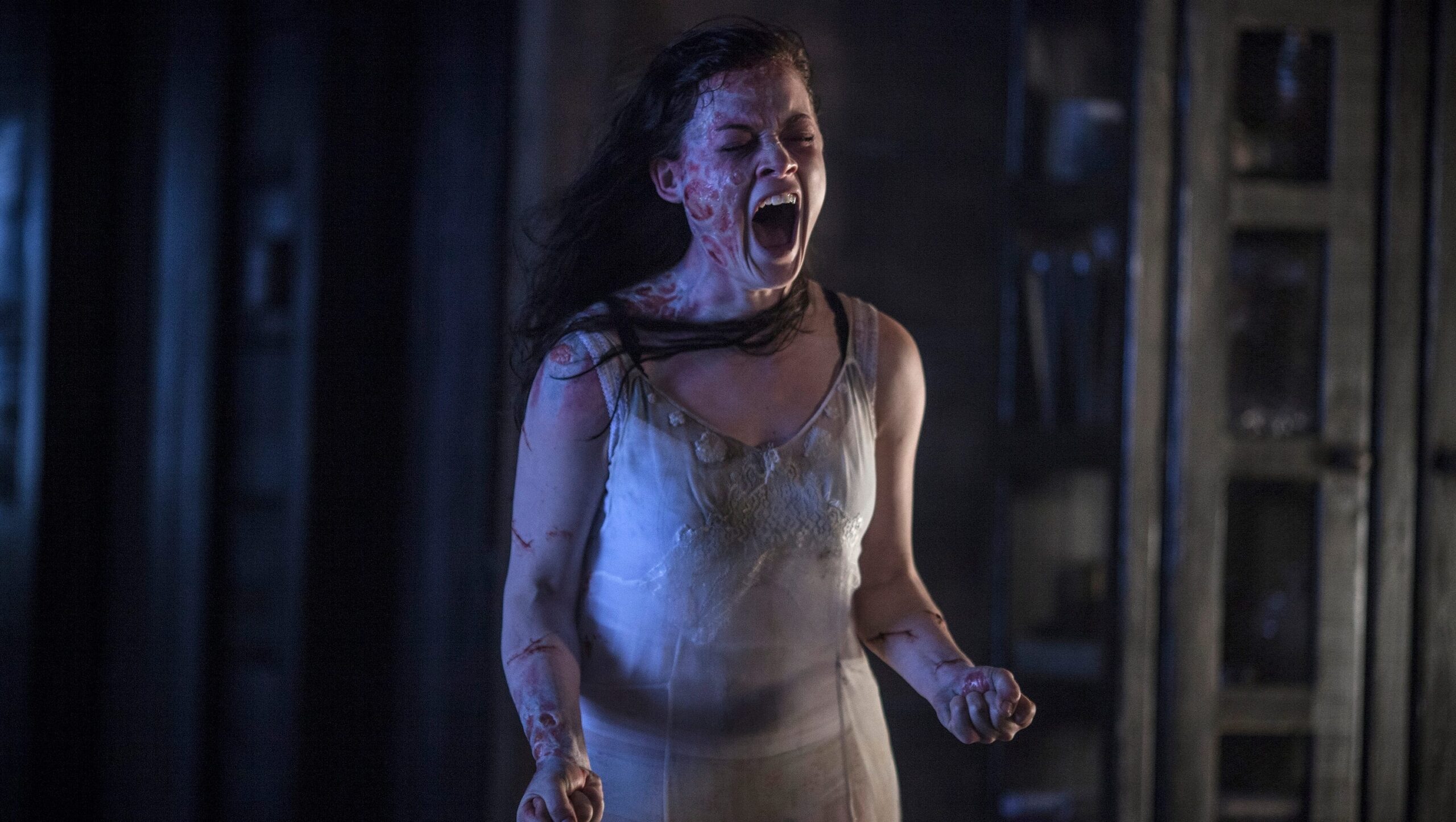 Jane Levy screaming and scalded in Evil Dead still, revised by Diablo Cody